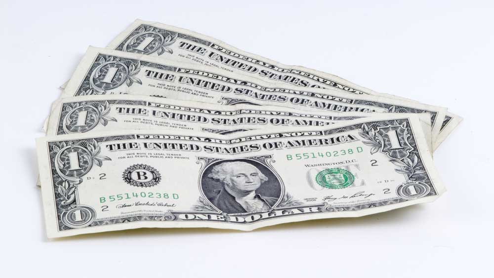 four one dollar bills on a white background